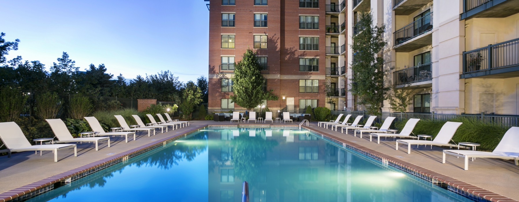 Resort style pool with lounge chairs