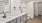 Spacious bathroom with a large vanity and mirror